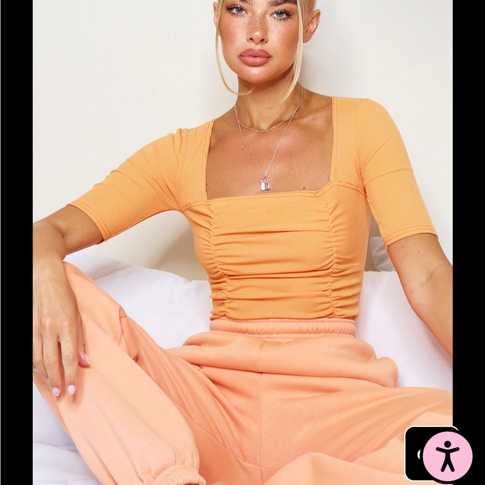 Pretty Little Thing Orange Body Suit (Size 4)